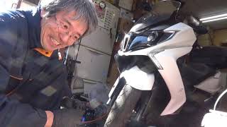 KYMCO　ダウンタウン125ABSのブレーキパッドの交換です