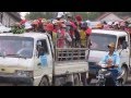 This is how many factory workers get to work in Cambodia - Can't imagine doing this daily