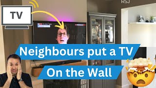 Neighbours put a TV on the wall! | Does soundproofing work both ways?