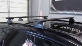 2013 BMW X3 with Thule 460R Podium AeroBlade Roof Rack by Rack Outfitters