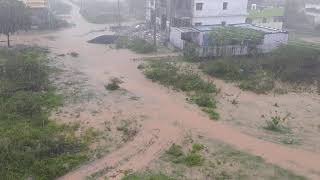 Rain water flowing down to town //Porumamilla// Kadapa district. Today