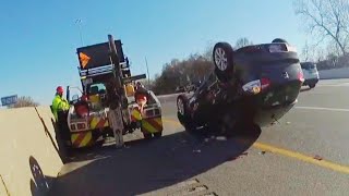 Driver Screams as Tow Truck Flips Car With Him Still Inside