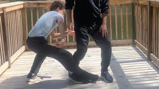 KarateFire.Org  Silat Serak - Beginners - Basic Applications of The Wipe and Stepping / FootTrapping