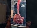 wagyu tomahawk steak on a grill