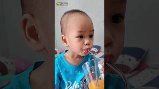 Cute baby drinking orange juice #shorts