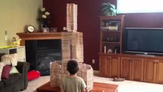 Destruction of a toy building block tower