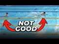 swimmer switches lanes in the middle of a championships race (DQ)