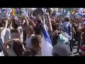 Protesters scuffle with police during protest in Tel Aviv