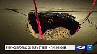 15-foot sinkhole forms on busy street in the Heights