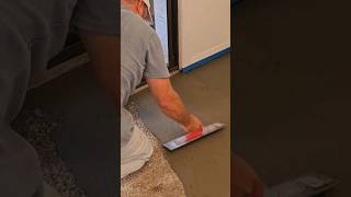 Skim floor with concrete to make smooth level for carpet tiles