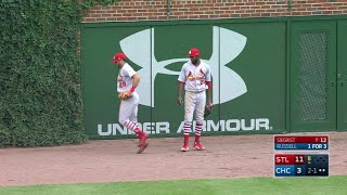 STL@CHC: Pham, Fowler collide in left on fly ball