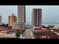 dronedopxt sobrevoando a praia grande litoral de são paulo