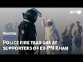 Pakistan police fire tear gas at supporters of ex-PM Khan | AFP