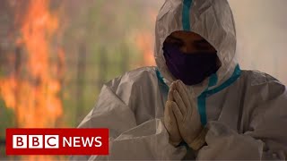 Delhi sees deadliest month amid raging pandemic - BBC News