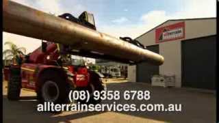 Manitou MHT 10210 with Pipe handler attachment