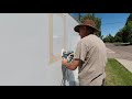 installing windows on a cargo trailer