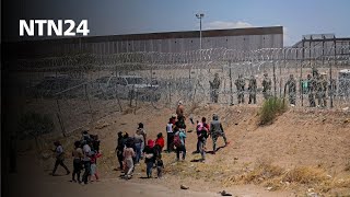 Decenas de migrantes intentaron atravesar la valla de púas entre México y Texas