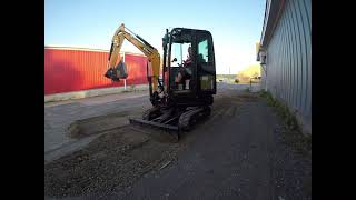 Sany Sy18c mini excavator, grading a pathway