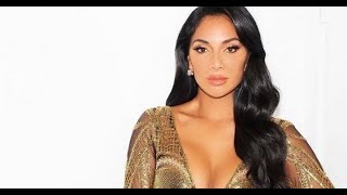 Nicole Scherzinger parades famous figure in plunging 'Golden Goddess' gown