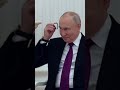 putin shows south sudan president how to put on translation earpiece