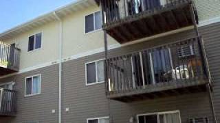 throwing an old couch off of a third story balcony