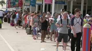 Cruise ship passengers wait for hours to board at PortMiami