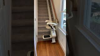 Stairlift with folding rail for steps.