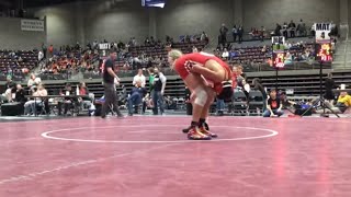 Girl kicks guy in the nuts during wrestling competition ￼