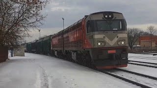 2M62UM-0116 (LDZ Cargo) with loaded grain hoppers leaving Jelgava station