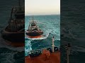 Port hedland tugs, assisting a bulk carrier.