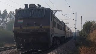 Train 14217 Prayagraj Chandigarh Unchahar Express arriving Ghaggar with TKD WAP4 22345