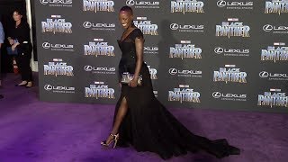 Florence Kasumba "Black Panther" World Premiere Purple Carpet