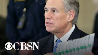 Texas governor pauses reopening as coronavirus cases surge