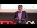 Combatting the loss of forest in Borneo | Henry Chan | TEDxUSMC