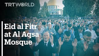 Muslims gather at Al Aqsa mosque for Eid al Fitr prayers