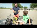 using real tractors and kids tractors for water balloon fight