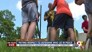 Volunteers clean up veterans cemetery