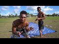 PLAYING TACKLE FOOTBALL ON A SLIP AND SLIDE