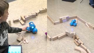 A 4th grader programs Dash to solve a maze