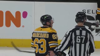 Brad Marchand and John Tavares exchange some words, following the late cross-check to Tavares