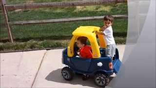 Cousins Sharing Little Tikes Cozy Truck