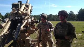 cannon crewmembers 155 triple 7 howitzer at JRTC