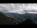 paragliding fiesch flying premiere in valais with a cloudy sky