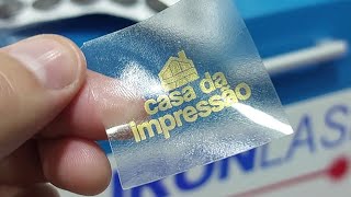 IMPRESSÃO DOURADA NA JATO DE TINTA, ADESIVO TRANSPARENTE MASTERPRINT