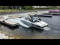 Inboard Boat Driving On Gulf Stream Docks