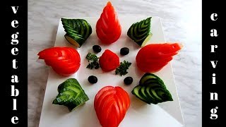Tomato and cucumber art veggie carving. Vegetable carving garnish