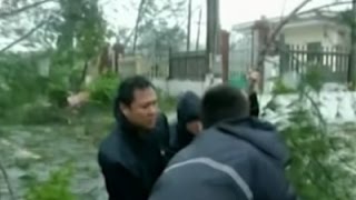 Raw: Typhoon Sarika Hits Southern China