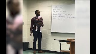 Georgia professor holds student's baby while teaching class