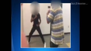 VIDEO: Teacher, student fight in school hallway