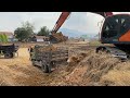 working dig the soil 7 times full dump truck by excavator doosan dx220 subscribe here @mightydiggers